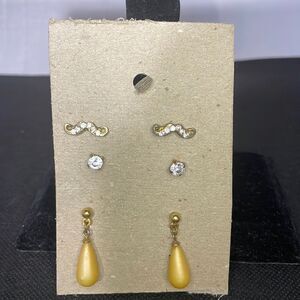 Three sets of earrings